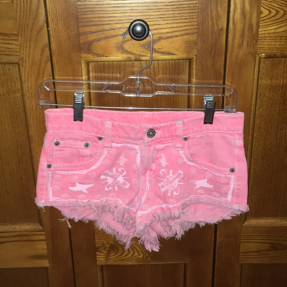 Bright pink shorts, size small.